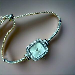 Women’s dainty vintage style silver tone adjustable bracelet watch
